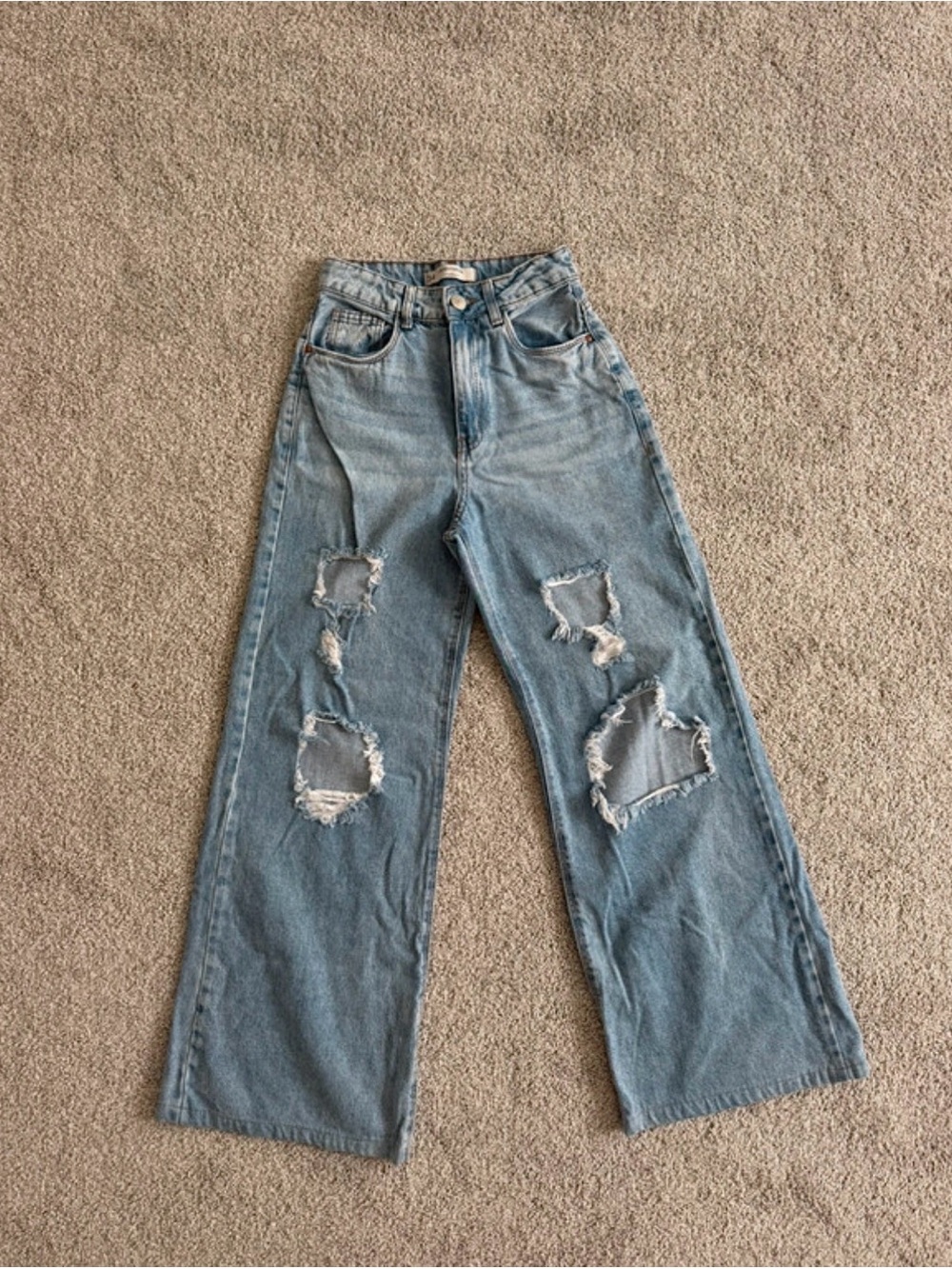 High-Rise Distressed Wide Leg Jeans in Light Blue